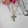 Heavenly Cross necklace with turquoise stone, handmade artisan pendant in 24k gold plated brass on durable stainless steel chain, symbolic spiritual jewelry, boho cross necklace, unique handmade small business accessory by Sunny Designs, Κολιέ Heavenly Cross με τιρκουάζ πέτρα, χειροποίητο μενταγιόν σταυρού από ορείχαλκο επιχρυσωμένο 24 καράτια σε ατσάλινη αλυσίδα, πνευματικό κόσμημα, boho χειροποίητο αξεσουάρ, μοναδικό κόσμημα μικρής επιχείρησης Sunny Designs
