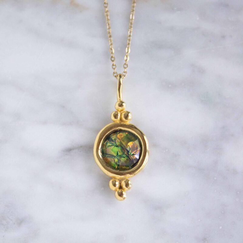 Harmony necklace with iridescent blue stone, handmade artisan pendant in 24k gold plated brass on stainless steel chain, symbolic circle jewelry, boho gemstone necklace, unique handmade small business accessory by Sunny Designs Χειροποίητο κολιέ Harmony με ιριδίζουσα μπλε πέτρα, μενταγιόν από επιχρυσωμένο ορείχαλκο και ατσάλινη αλυσίδα, affordable bohemian artisan jewelry, καλλιτεχνικό και πνευματικό κόσμημα Sunny Designs