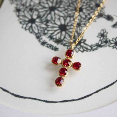 Heavenly Cross necklace with red stone, handmade artisan pendant in 24k gold plated brass on durable stainless steel chain, symbolic spiritual jewelry, boho cross necklace, unique handmade small business accessory by Sunny Designs Χειροποίητο κολιέ σταυρός Heavenly Cross με κόκκινη πέτρα, επιχρυσωμένο μενταγιόν από ορείχαλκο, ατσάλινη αλυσίδα, affordable bohemian artisan jewelry, συμβολικό κόσμημα πίστης από τη Sunny Designs