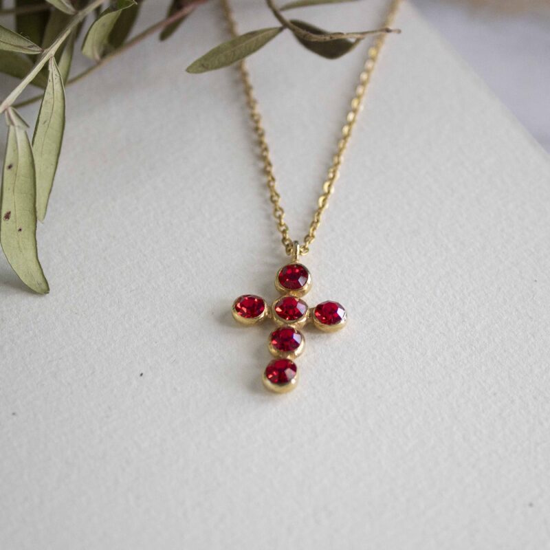 Heavenly Cross necklace with red stone, handmade artisan pendant in 24k gold plated brass on durable stainless steel chain, symbolic spiritual jewelry, boho cross necklace, unique handmade small business accessory by Sunny Designs Χειροποίητο κολιέ σταυρός Heavenly Cross με κόκκινη πέτρα, επιχρυσωμένο μενταγιόν από ορείχαλκο, ατσάλινη αλυσίδα, affordable bohemian artisan jewelry, συμβολικό κόσμημα πίστης από τη Sunny Designs