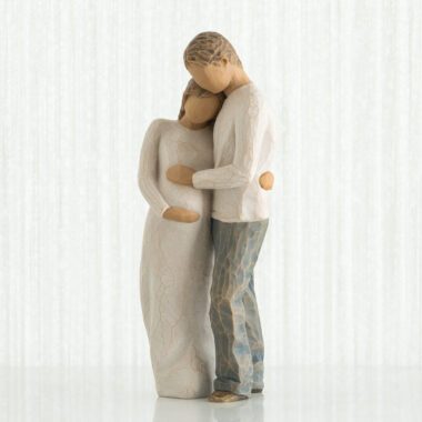 Home Together, our family is home A gift to celebrate new beginnings, new babies, new families… and the loving relationships that develop between parent and child. Product Details 8.5”h hand-painted resin figure Figure of standing man and pregnant woman embracing. Woman in cream dress, man in cream shirt and blue jeans Packaging box includes enclosure card for gift-giving Dust with soft cloth or soft brush. Avoid water or cleaning solvents
