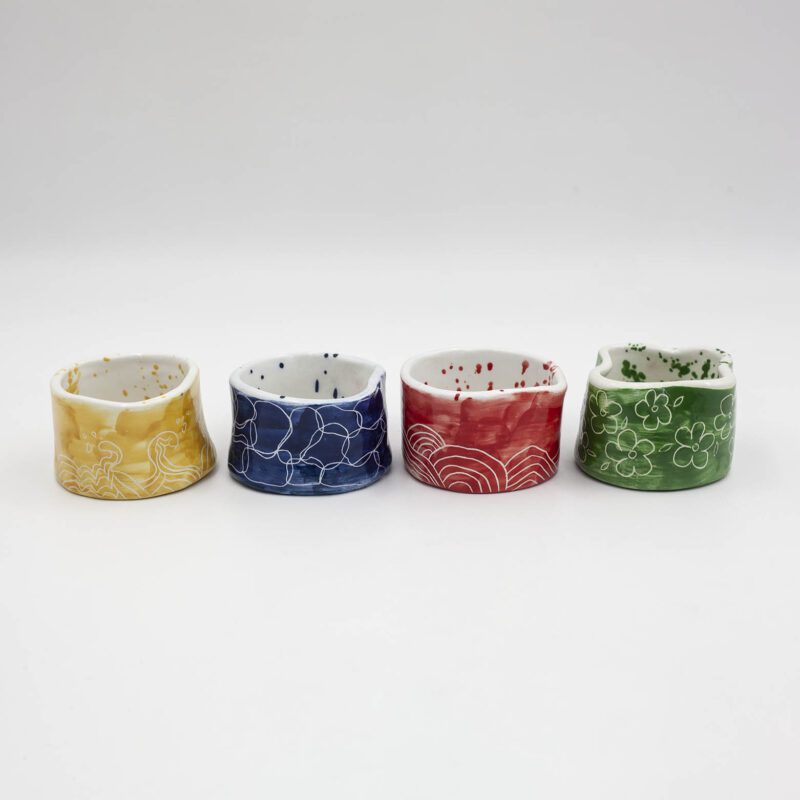 Embrace nature's beauty! This handcrafted ceramic mug set features a vibrant collection of colorful cups, each adorned with a unique element of nature. Perfect for enjoying your favorite beverage and adding a touch of the outdoors to your kitchen. (keywords: mug set, ceramic mug set, handmade mug set, nature design, colorful mugs, kitchenware) Απολαύστε τη ομορφιά της φύσης! Αυτό το χειροποίητο σετ φλιτζανιών από κεραμικό διαθέτει μια ζωντανή συλλογή από πολύχρωμα φλιτζάνια, το καθένα διακοσμημένο με ένα μοναδικό στοιχείο της φύσης. Ιδανικό για να απολαύσετε το αγαπημένο σας ρόφημα και να προσθέσετε μια πινελιά της φύσης στην κουζίνα σας. (keywords: σετ φλιτζανιών, σετ φλιτζανιών από κεραμικό, χειροποίητο σετ φλιτζανιών, σχέδια φύσης, πολύχρωμα φλιτζάνια, είδη κουζίνας)