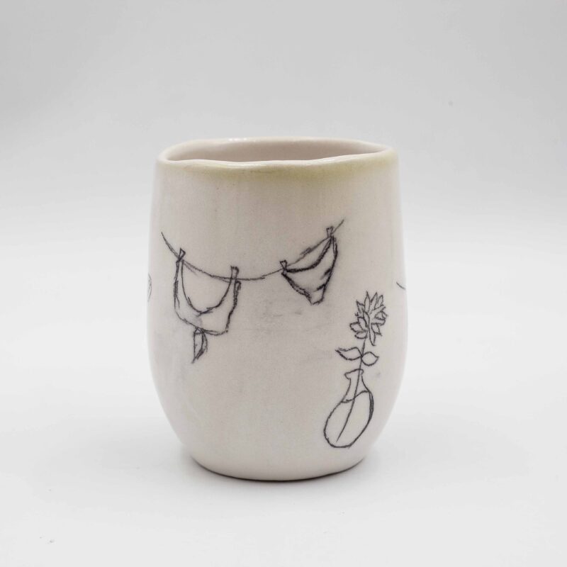 Handmade ceramic mug painted with a pencil, featuring summer-themed designs such as bikinis, shells, wine, and fruits. This vibrant and artistic mug adds a touch of summer fun and relaxation to your drinkware collection, perfect for enjoying your favorite beverages. Χειροποίητη κεραμική κούπα ζωγραφισμένη με μολύβι, με καλοκαιρινά σχέδια όπως μαγιό, κοχύλια, κρασί και φρούτα. Αυτή η ζωντανή και καλλιτεχνική κούπα προσθέτει μια πινελιά καλοκαιρινής διασκέδασης και χαλάρωσης στη συλλογή σας από ποτήρια, ιδανική για να απολαύσετε τα αγαπημένα σας ποτά.