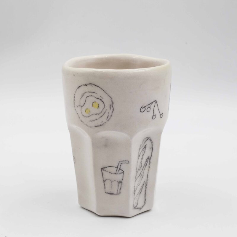 Handmade ceramic mug painted with a pencil, featuring summer-themed designs such as bikinis, shells, wine, and fruits. This vibrant and artistic mug adds a touch of summer fun and relaxation to your drinkware collection, perfect for enjoying your favorite beverages. Χειροποίητη κεραμική κούπα ζωγραφισμένη με μολύβι, με καλοκαιρινά σχέδια όπως μαγιό, κοχύλια, κρασί και φρούτα. Αυτή η ζωντανή και καλλιτεχνική κούπα προσθέτει μια πινελιά καλοκαιρινής διασκέδασης και χαλάρωσης στη συλλογή σας από ποτήρια, ιδανική για να απολαύσετε τα αγαπημένα σας ποτά.