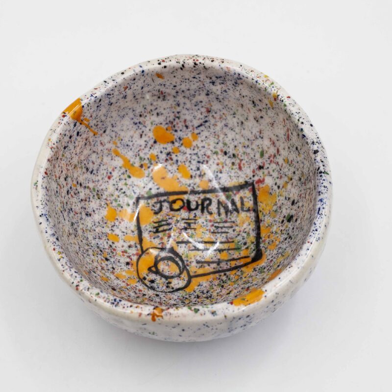 English: "Handmade ceramic bowl featuring Pollock-inspired dots and vibrant summer designs. This unique and artistic bowl adds a splash of color and creativity to your kitchenware collection, perfect for serving salads, fruits, and snacks." Greek: "Χειροποίητο κεραμικό μπολ με πουά σχέδια εμπνευσμένα από τον Pollock και ζωντανά καλοκαιρινά μοτίβα. Αυτό το μοναδικό και καλλιτεχνικό μπολ προσθέτει μια πινελιά χρώματος και δημιουργικότητας στη συλλογή της κουζίνας σας, ιδανικό για σερβίρισμα σαλατών, φρούτων και σνακ.