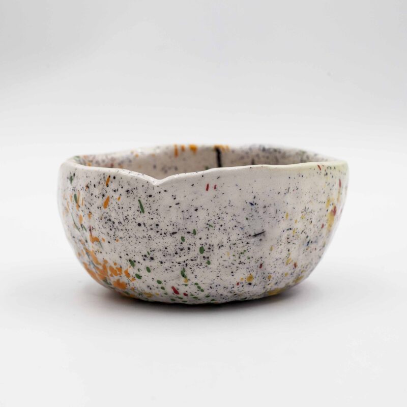 English: "Handmade ceramic bowl featuring Pollock-inspired dots and vibrant summer designs. This unique and artistic bowl adds a splash of color and creativity to your kitchenware collection, perfect for serving salads, fruits, and snacks." Greek: "Χειροποίητο κεραμικό μπολ με πουά σχέδια εμπνευσμένα από τον Pollock και ζωντανά καλοκαιρινά μοτίβα. Αυτό το μοναδικό και καλλιτεχνικό μπολ προσθέτει μια πινελιά χρώματος και δημιουργικότητας στη συλλογή της κουζίνας σας, ιδανικό για σερβίρισμα σαλατών, φρούτων και σνακ.