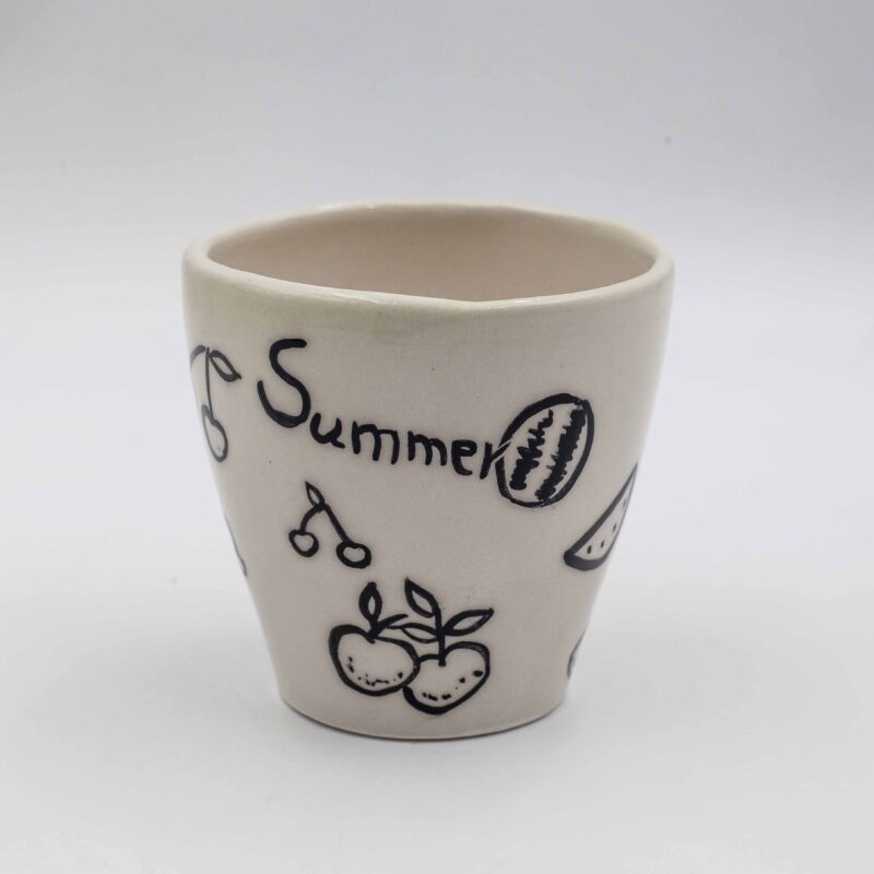 Handmade ceramic mug adorned with vibrant, hand-painted fruits. This unique and colorful mug brings a fresh, artistic touch to your drinkware collection, perfect for enjoying coffee, tea, or any favorite beverage." Greek: "Χειροποίητη κεραμική κούπα διακοσμημένη με ζωηρά, ζωγραφισμένα φρούτα. Αυτή η μοναδική και πολύχρωμη κούπα προσθέτει μια φρέσκια, καλλιτεχνική πινελιά στη συλλογή σας από ποτήρια, ιδανική για να απολαύσετε καφέ, τσάι ή οποιοδήποτε αγαπημένο ποτό.