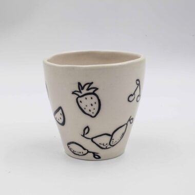 Handmade ceramic mug adorned with vibrant, hand-painted fruits. This unique and colorful mug brings a fresh, artistic touch to your drinkware collection, perfect for enjoying coffee, tea, or any favorite beverage.