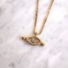InnSaei Eye necklace, handmade artisan pendant in 24k gold plated brass on stainless steel chain, symbolic protective eye jewelry, boho spiritual necklace, unique handmade small business accessory by Sunny Designs Κολιέ InnSaei Eye, χειροποίητο μενταγιόν ματιού από ορείχαλκο επιχρυσωμένο 24 καράτια σε ατσάλινη αλυσίδα, συμβολικό κόσμημα προστασίας, boho χειροποίητο αξεσουάρ, μοναδικό κόσμημα μικρής επιχείρησης Sunny Designs