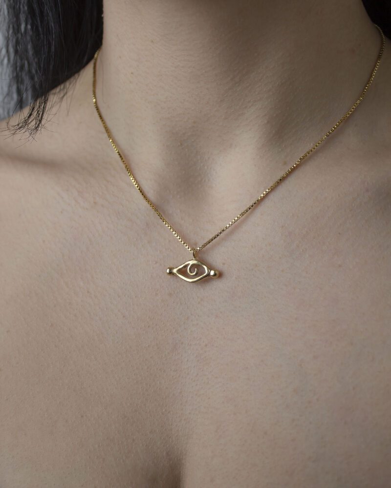 InnSaei Eye necklace, handmade artisan pendant in 24k gold plated brass on stainless steel chain, symbolic protective eye jewelry, boho spiritual necklace, unique handmade small business accessory by Sunny Designs Κολιέ InnSaei Eye, χειροποίητο μενταγιόν ματιού από ορείχαλκο επιχρυσωμένο 24 καράτια σε ατσάλινη αλυσίδα, συμβολικό κόσμημα προστασίας, boho χειροποίητο αξεσουάρ, μοναδικό κόσμημα μικρής επιχείρησης Sunny Designs