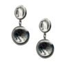 Silver shiny earrings that resemble double buttons, crafted from 925 sterling silver for a chic, modern look. silver earrings, double button earrings, sterling silver 925 earrings, shiny silver jewelry, modern earrings, silver button earrings, women's earrings, stylish silver earrings, jewelry gift, luxury earrings Ασημένια λαμπερά σκουλαρίκια που μοιάζουν με διπλά κουμπιά, κατασκευασμένα από ασήμι 925 για μοντέρνα και κομψή εμφάνιση. ασημένια σκουλαρίκια, σκουλαρίκια διπλό κουμπί, σκουλαρίκια ασήμι 925, λαμπερό ασημένιο κόσμημα, μοντέρνα σκουλαρίκια, σκουλαρίκια κουμπιά, γυναικεία σκουλαρίκια, κομψά ασημένια σκουλαρίκια, δώρο κόσμημα, πολυτελή σκουλαρίκια