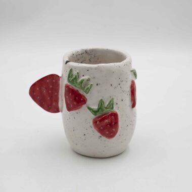 Handmade ceramic mug decorated with 3D fruits, featuring cherries, strawberries, and blueberries for a playful and vibrant touch. Perfect for adding a unique, fruity accent to any kitchen or mug collection. Χειροποίητη κεραμική κούπα διακοσμημένη με 3D φρούτα, όπως κεράσια, φράουλες και μύρτιλα, για μια παιχνιδιάρικη και ζωντανή πινελιά. Ιδανική για να προσθέσει έναν μοναδικό, φρουτώδη τόνο σε κάθε κουζίνα ή συλλογή από κούπες.