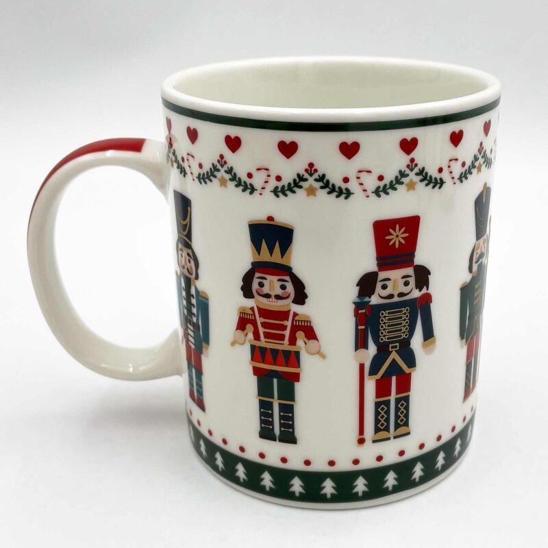 Christmas Mug – Colorful Nutcracker Design A delightful Christmas mug featuring vibrant and colorful nutcracker figures all around. Perfect for sipping hot cocoa or coffee during the holiday season. A cheerful addition to your festive celebrations and an excellent Christmas gift idea. Keywords: Christmas mug, colorful nutcracker design, festive holiday mug, vibrant Christmas cup, Christmas gifts, holiday drinkware, nutcracker-themed mug, unique Christmas gift, cheerful holiday mug, holiday coffee mug. Χριστουγεννιάτικη Κούπα – Πολύχρωμοι Καρυοθραύστες Μια υπέροχη χριστουγεννιάτικη κούπα διακοσμημένη με ζωντανά και πολύχρωμα σχέδια καρυοθραυστών γύρω γύρω. Ιδανική για ζεστή σοκολάτα ή καφέ την εορταστική περίοδο. Ένα χαρούμενο στοιχείο για τις γιορτινές σας στιγμές και μια εξαιρετική ιδέα για χριστουγεννιάτικο δώρο. Λέξεις-κλειδιά: χριστουγεννιάτικη κούπα, πολύχρωμοι καρυοθραύστες, γιορτινή κούπα, ζωντανή χριστουγεννιάτικη κούπα, χριστουγεννιάτικα δώρα, γιορτινά σερβίτσια, κούπα με θέμα τον καρυοθραύστη, μοναδικό χριστουγεννιάτικο δώρο, χαρούμενη κούπα γιορτών, κούπα για καφέ στις γιορτές.