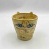 Handmade ceramic mugs inspired by cats, featuring designs of a Siamese cat, a tabby, a black cat, a yellow cat, and a special edition inspired by Vincent van Gogh's 'Starry Night.' Perfect for cat lovers and art enthusiasts! Χειροποίητες κεραμικές κούπες εμπνευσμένες από γάτες, με σχέδια Σιάμ, τιγρέ, μαύρης γάτας, κίτρινης γάτας και μια ειδική έκδοση εμπνευσμένη από το έργο 'Έναστρη Νύχτα' του Vincent van Gogh. Ιδανικές για λάτρεις των γατών και της τέχνης!