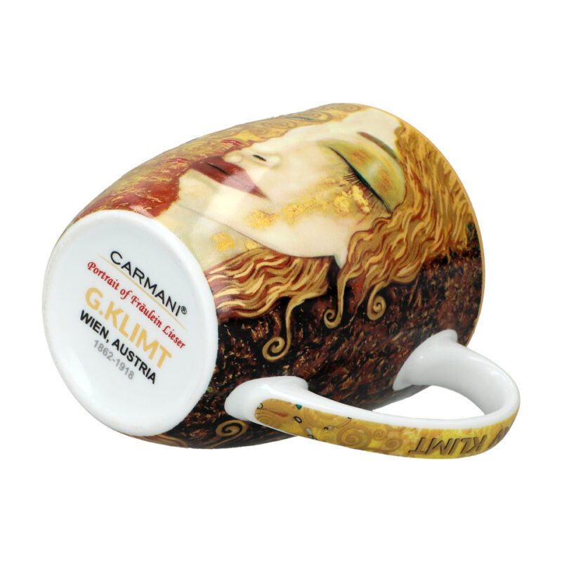 Camio mug - G. Klimt, Golden Tears (CARMANI). This elegant mug features the stunning "Golden Tears" artwork by Gustav Klimt. Made from high-quality porcelain, it offers a refined design for art enthusiasts and a luxurious addition to any collection. Produced by Carmani, this limited edition mug is perfect for enjoying your favorite beverages with a touch of elegance. 400ml capacity. Κούπα Camio - Γκ. Κλιμτ, Χρυσά Δάκρυα (CARMANI). Αυτή η κομψή κούπα διαθέτει το εντυπωσιακό έργο "Χρυσά Δάκρυα" του Γκ. Κλιμτ. Κατασκευασμένη από υψηλής ποιότητας πορσελάνη, προσφέρει έναν εκλεπτυσμένο σχεδιασμό για τους λάτρεις της τέχνης και αποτελεί μια πολυτελή προσθήκη σε οποιαδήποτε συλλογή. Παραγωγής Carmani, αυτή η περιορισμένης έκδοσης κούπα είναι ιδανική για να απολαμβάνετε τα αγαπημένα σας ροφήματα με μια πινελιά κομψότητας. Χωρητικότητα 400ml. Camio mug, Gustav Klimt, Golden Tears, art mug, limited edition mug, porcelain mug, Carmani mug, luxury mug, art-inspired mug, Klimt mug, κούπα, Κλιμτ, Χρυσά Δάκρυα, πορσελάνη, πολυτελή κούπα, περιορισμένη έκδοση, κούπα τέχνης.