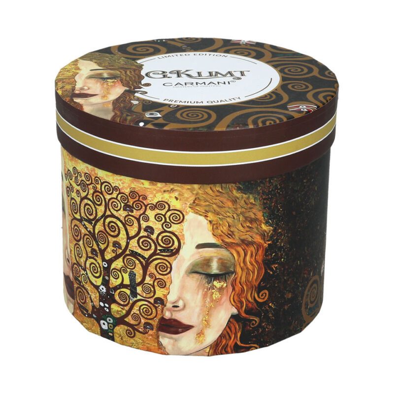 Camio mug - G. Klimt, Golden Tears (CARMANI). This elegant mug features the stunning "Golden Tears" artwork by Gustav Klimt. Made from high-quality porcelain, it offers a refined design for art enthusiasts and a luxurious addition to any collection. Produced by Carmani, this limited edition mug is perfect for enjoying your favorite beverages with a touch of elegance. 400ml capacity. Κούπα Camio - Γκ. Κλιμτ, Χρυσά Δάκρυα (CARMANI). Αυτή η κομψή κούπα διαθέτει το εντυπωσιακό έργο "Χρυσά Δάκρυα" του Γκ. Κλιμτ. Κατασκευασμένη από υψηλής ποιότητας πορσελάνη, προσφέρει έναν εκλεπτυσμένο σχεδιασμό για τους λάτρεις της τέχνης και αποτελεί μια πολυτελή προσθήκη σε οποιαδήποτε συλλογή. Παραγωγής Carmani, αυτή η περιορισμένης έκδοσης κούπα είναι ιδανική για να απολαμβάνετε τα αγαπημένα σας ροφήματα με μια πινελιά κομψότητας. Χωρητικότητα 400ml. Camio mug, Gustav Klimt, Golden Tears, art mug, limited edition mug, porcelain mug, Carmani mug, luxury mug, art-inspired mug, Klimt mug, κούπα, Κλιμτ, Χρυσά Δάκρυα, πορσελάνη, πολυτελή κούπα, περιορισμένη έκδοση, κούπα τέχνης.