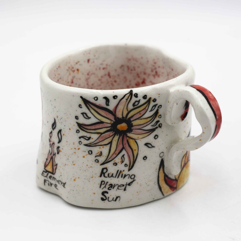 Unique handmade ceramic zodiac mugs, each crafted with artistic detail and vibrant paintings. Every mug features a different zodiac sign, showcasing its ruling planet, favorite flower, element, and symbol. A perfect astrology-inspired gift for horoscope lovers and collectors. Beautiful, functional, and one-of-a-kind ceramic art! Μοναδικές χειροποίητες κεραμικές κούπες ζωδίων, κάθε μία με ξεχωριστή καλλιτεχνική διακόσμηση και ζωηρές ζωγραφιές. Κάθε κούπα απεικονίζει ένα διαφορετικό ζώδιο, με τον κυβερνήτη πλανήτη του, το αγαπημένο του λουλούδι, το στοιχείο και το σύμβολό του. Ένα τέλειο δώρο για λάτρεις της αστρολογίας και συλλέκτες. Όμορφη, χρηστική και μοναδική κεραμική τέχνη!