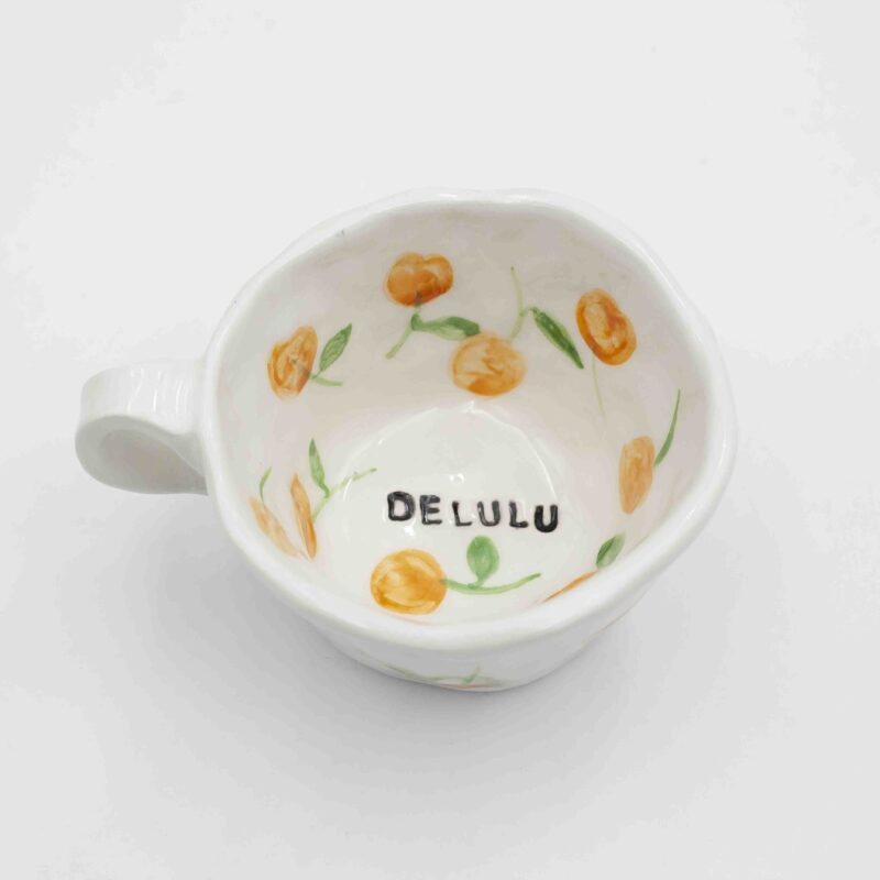 Handmade ceramic mug with messages inside and out, featuring unique floral, fruity, or minimalist designs. A beautifully crafted coffee mug, perfect for everyday use or as a thoughtful gift. Durable, stylish, and ideal for tea or coffee lovers." Greek: "Χειροποίητη κεραμική κούπα με μηνύματα στο εσωτερικό και το εξωτερικό, διακοσμημένη με μοναδικά φλοράλ, φρουτώδη ή minimal σχέδια. Κομψή και ανθεκτική κούπα καφέ, ιδανική για καθημερινή χρήση ή ως ξεχωριστό δώρο για λάτρεις του τσαγιού και του καφέ.