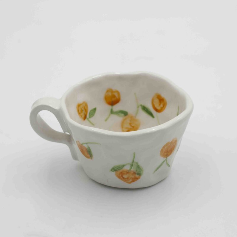 Handmade ceramic mug with messages inside and out, featuring unique floral, fruity, or minimalist designs. A beautifully crafted coffee mug, perfect for everyday use or as a thoughtful gift. Durable, stylish, and ideal for tea or coffee lovers." Greek: "Χειροποίητη κεραμική κούπα με μηνύματα στο εσωτερικό και το εξωτερικό, διακοσμημένη με μοναδικά φλοράλ, φρουτώδη ή minimal σχέδια. Κομψή και ανθεκτική κούπα καφέ, ιδανική για καθημερινή χρήση ή ως ξεχωριστό δώρο για λάτρεις του τσαγιού και του καφέ.