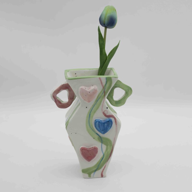 beautiful ceramic vase with lines and hearts and colors. Κεραμικό βάζο με καρδιές και γραμμές και παλ χρώματα.