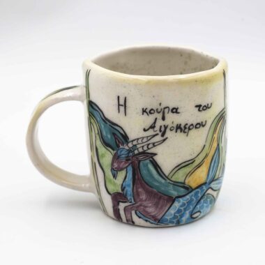 Unique handmade ceramic zodiac mugs, each crafted with artistic detail and vibrant paintings. Every mug features a different zodiac sign, showcasing its ruling planet, favorite flower, element, and symbol. A perfect astrology-inspired gift for horoscope lovers and collectors. Beautiful, functional, and one-of-a-kind ceramic art! Μοναδικές χειροποίητες κεραμικές κούπες ζωδίων, κάθε μία με ξεχωριστή καλλιτεχνική διακόσμηση και ζωηρές ζωγραφιές. Κάθε κούπα απεικονίζει ένα διαφορετικό ζώδιο, με τον κυβερνήτη πλανήτη του, το αγαπημένο του λουλούδι, το στοιχείο και το σύμβολό του. Ένα τέλειο δώρο για λάτρεις της αστρολογίας και συλλέκτες. Όμορφη, χρηστική και μοναδική κεραμική τέχνη!