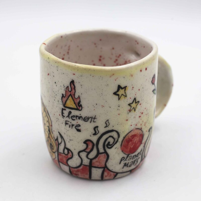 Unique handmade ceramic zodiac mugs, each crafted with artistic detail and vibrant paintings. Every mug features a different zodiac sign, showcasing its ruling planet, favorite flower, element, and symbol. A perfect astrology-inspired gift for horoscope lovers and collectors. Beautiful, functional, and one-of-a-kind ceramic art! Μοναδικές χειροποίητες κεραμικές κούπες ζωδίων, κάθε μία με ξεχωριστή καλλιτεχνική διακόσμηση και ζωηρές ζωγραφιές. Κάθε κούπα απεικονίζει ένα διαφορετικό ζώδιο, με τον κυβερνήτη πλανήτη του, το αγαπημένο του λουλούδι, το στοιχείο και το σύμβολό του. Ένα τέλειο δώρο για λάτρεις της αστρολογίας και συλλέκτες. Όμορφη, χρηστική και μοναδική κεραμική τέχνη!