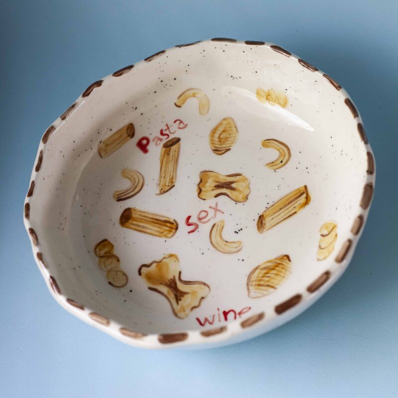 handmade ceramic plate with pasta. χειροποίητο κεραμικό πιάτο με μακαρόνια.