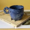 Ultra summer handmade ceramic mug. painted blue like the ocean and carved jellyfishes. perfect for capuccino, turkish coffee and espresso. Πολύ καλοκαιρινές κούπες με χαραγμένες μέδουσες πάνω. Τέλεια για καπουτσίνο, εσπρέσο, ελληνικό και τσάι.