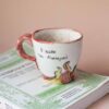 handmade ceramic mug about leo. with leo vibes, symbols and planets. Χειροποίητη κεραμική κούπα του λέοντα με φωτιές και σύμβολα και πλανήτες.