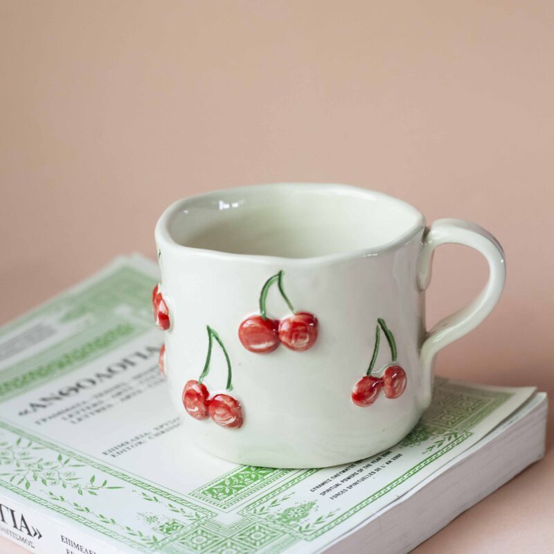 Handmade mug with 3d cherries. 3 sizes. 1 for espresso , 2 for capuccino, 3 for filter. χειροποίητη κεραμική κούπα με 3ντι κεράσια σε τρία μεγέθη. 1 για εσπρέσο, 2 για καπουτσίνο και 3 για φίλτρου.