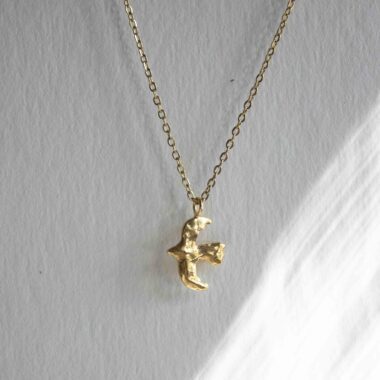 Bird of Freedom necklace, elegant 24k gold plated brass artisan pendant depicting a flying bird, boho chic symbolic jewelry, handmade jewelry for free-spirited style by Sunny Designs