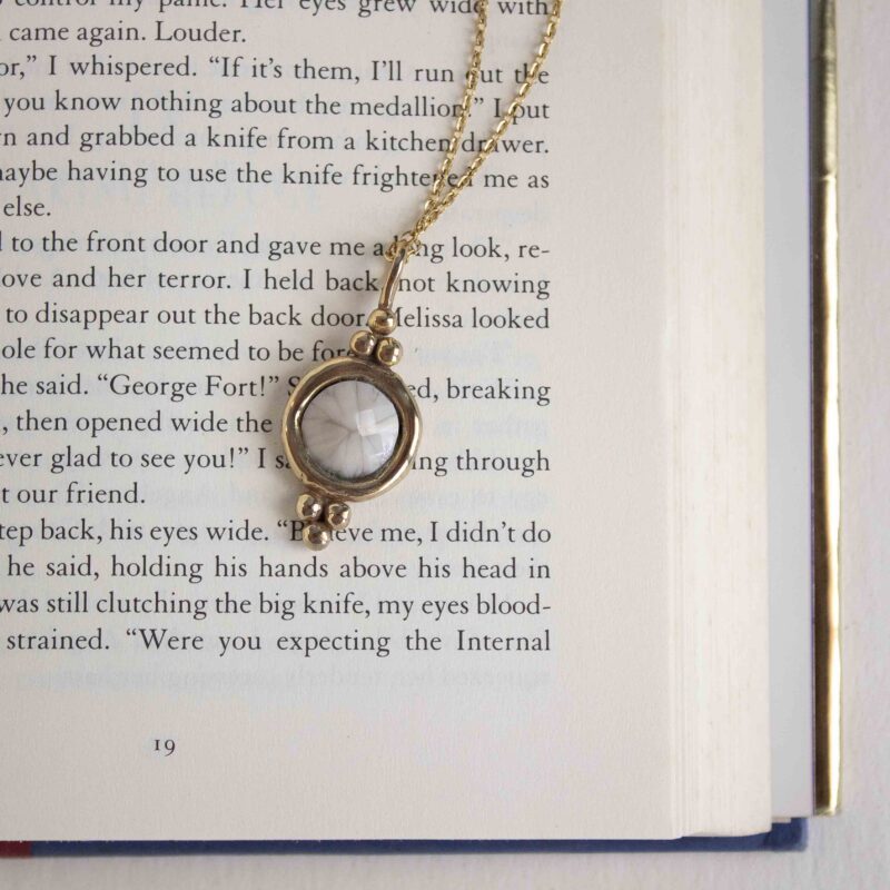 Harmony necklace with white stone, handmade artisan pendant in 24k gold plated brass on stainless steel chain, symbolic circle jewelry, boho gemstone necklace, unique handmade small business accessory by Sunny Designs Χειροποίητο κολιέ Harmony με λευκή πέτρα, μενταγιόν από επιχρυσωμένο ορείχαλκο και ατσάλινη αλυσίδα, affordable bohemian artisan jewelry, κομψό και πνευματικό κόσμημα Sunny Designs