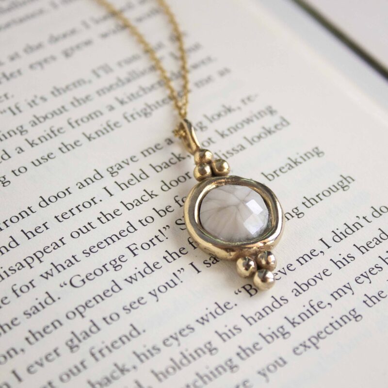 Harmony necklace with white stone, handmade artisan pendant in 24k gold plated brass on stainless steel chain, symbolic circle jewelry, boho gemstone necklace, unique handmade small business accessory by Sunny Designs Χειροποίητο κολιέ Harmony με λευκή πέτρα, μενταγιόν από επιχρυσωμένο ορείχαλκο και ατσάλινη αλυσίδα, affordable bohemian artisan jewelry, κομψό και πνευματικό κόσμημα Sunny Designs