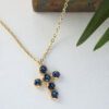 Heavenly Cross necklace with blue Swarovski stone, handmade artisan pendant in 24k gold plated brass on durable stainless steel chain, symbolic spiritual jewelry, boho cross necklace, unique handmade small business accessory by Sunny Designs Κολιέ Heavenly Cross με μπλε πέτρα Swarovski, χειροποίητο μενταγιόν σταυρού από ορείχαλκο επιχρυσωμένο 24 καράτια σε ατσάλινη αλυσίδα, πνευματικό κόσμημα, boho χειροποίητο αξεσουάρ, μοναδικό κόσμημα μικρής επιχείρησης Sunny Designs