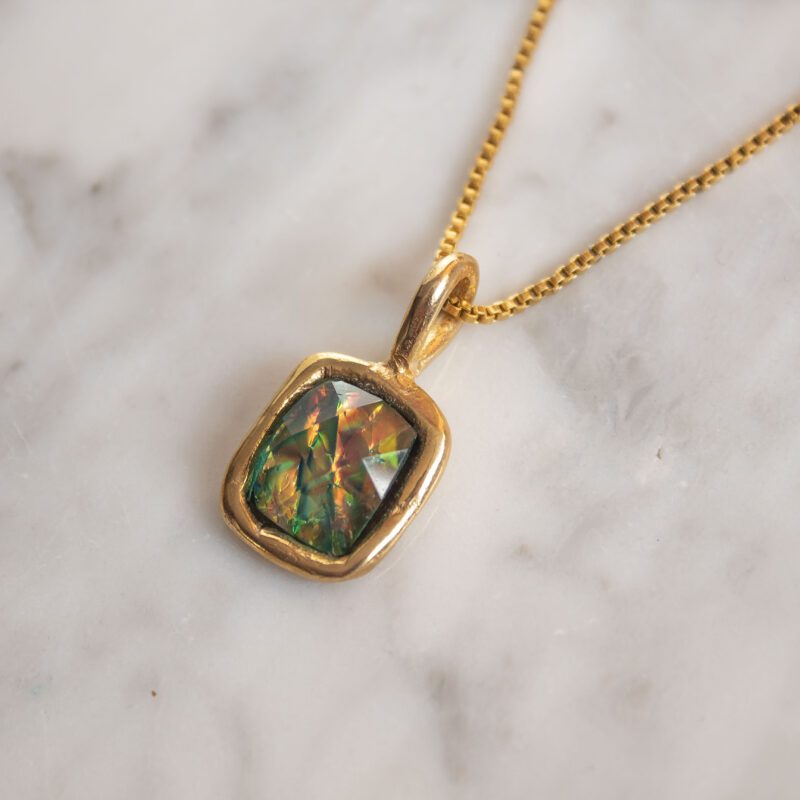 Ethereal necklace with iridescent blue stone, handmade artisan pendant in 24k gold plated brass on stainless steel chain, shimmering gemstone necklace, boho chic jewelry, unique handmade small business accessory by Sunny Designs Κολιέ Ethereal με ιριδίζουσα μπλε πέτρα, χειροποίητο μενταγιόν από ορείχαλκο επιχρυσωμένο 24 καράτια σε ατσάλινη αλυσίδα, λαμπερό boho κόσμημα, μοναδικό χειροποίητο αξεσουάρ από μικρή επιχείρηση Sunny Designs
