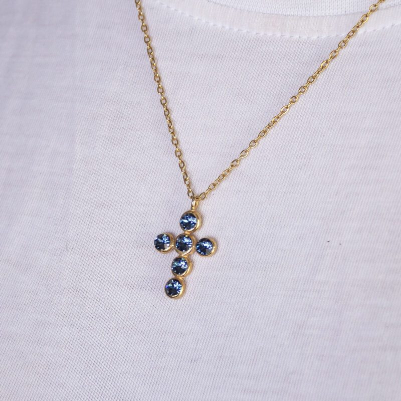 Heavenly Cross necklace with blue Swarovski stone, handmade artisan pendant in 24k gold plated brass on durable stainless steel chain, symbolic spiritual jewelry, boho cross necklace, unique handmade small business accessory by Sunny Designs Κολιέ Heavenly Cross με μπλε πέτρα Swarovski, χειροποίητο μενταγιόν σταυρού από ορείχαλκο επιχρυσωμένο 24 καράτια σε ατσάλινη αλυσίδα, πνευματικό κόσμημα, boho χειροποίητο αξεσουάρ, μοναδικό κόσμημα μικρής επιχείρησης Sunny Designs