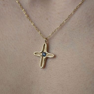 Maria’s Cross necklace with blue Swarovski stone, handmade artisan pendant in 24k gold plated brass on durable stainless steel chain, symbolic spiritual jewelry, boho cross necklace, unique handmade small business accessory by Sunny Designs , Κολιέ Maria’s Cross με μπλε πέτρα Swarovski, χειροποίητο μενταγιόν σταυρού από ορείχαλκο επιχρυσωμένο 24 καράτια σε ατσάλινη αλυσίδα, πνευματικό κόσμημα, boho χειροποίητο αξεσουάρ, μοναδικό κόσμημα μικρής επιχείρησης Sunny Designs