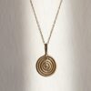 Concentric circle necklace, handmade pendant in 24k gold plated brass on stainless steel chain, minimalist geometric jewelry, symbolic circles representing harmony, infinity and connection, unique artisan boho necklace by Sunny Designs Κολιέ Concentric Circle, κομψό χειροποίητο σχέδιο ομόκεντρων κύκλων από ορείχαλκο επιχρυσωμένο 24 καράτια, boho chic γεωμετρικό κόσμημα για layering ή καθημερινή χρήση, μοναδικό κόσμημα μικρής επιχείρησης Sunny Designs