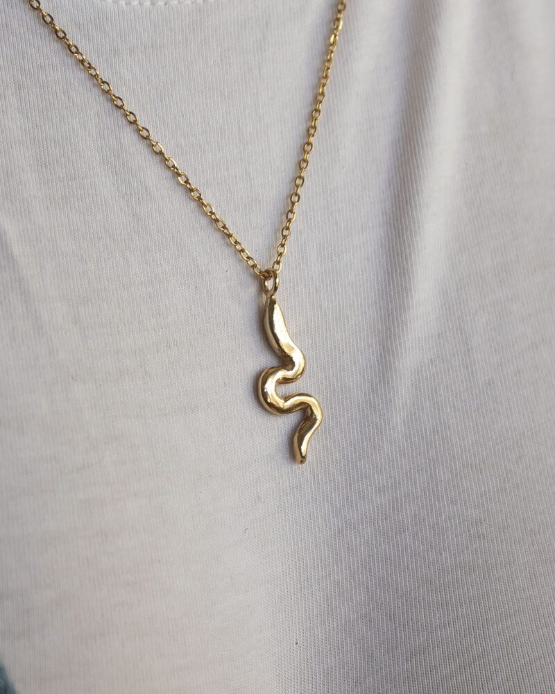 Small snake necklace, handmade serpent pendant in 24k gold plated brass on stainless steel chain, symbolic snake jewelry, boho chic necklace, unique handmade small business accessory by Sunny Designs Κολιέ Small Snake, χειροποίητο μενταγιόν φιδιού από ορείχαλκο επιχρυσωμένο 24 καράτια σε ατσάλινη αλυσίδα, συμβολικό κόσμημα, boho χειροποίητο αξεσουάρ από τη Sunny Designs