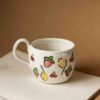 A beautiful ceramic mug painted with fruits. perfect for your tea and coffee. χειροποίητη κεραμική κούπα ζωγραφισμένη με φρούτα. Ιδανική για τσάι και καφέ.