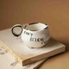 A beautiful ceramic mug that writes don't believe everything you think. perfect for your espresso coffee. χειροποίητη κεραμική κούπα που γράφει μην πιστεύεις όσα σκέφτεσαι. Ιδανική για εσπρέσσο καφέ.