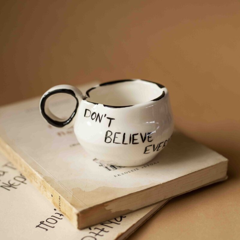 A beautiful ceramic mug that writes don't believe everything you think. perfect for your espresso coffee. χειροποίητη κεραμική κούπα που γράφει μην πιστεύεις όσα σκέφτεσαι. Ιδανική για εσπρέσσο καφέ.