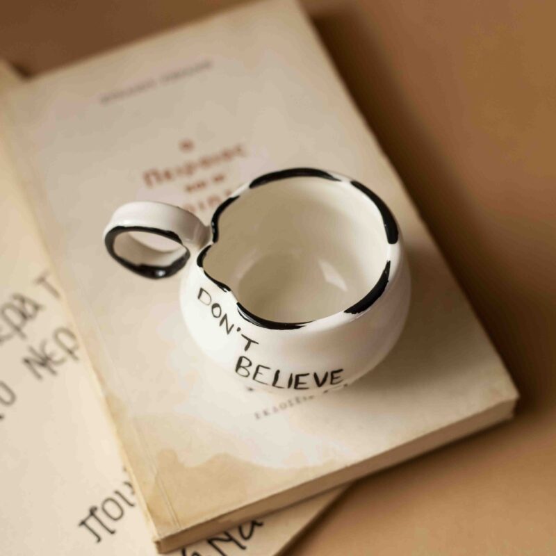 A beautiful ceramic mug that writes don't believe everything you think. perfect for your espresso coffee. χειροποίητη κεραμική κούπα που γράφει μην πιστεύεις όσα σκέφτεσαι. Ιδανική για εσπρέσσο καφέ.