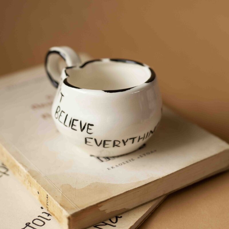 A beautiful ceramic mug that writes don't believe everything you think. perfect for your espresso coffee. χειροποίητη κεραμική κούπα που γράφει μην πιστεύεις όσα σκέφτεσαι. Ιδανική για εσπρέσσο καφέ.