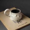 Ceramic handmade mug with 3d ghosts. Perfect for coffee and tea. With halloween Vibes. Χειροποίητη κεραμική κούπα με 3D φαντασματάκια. κατάλληλη για το Χάλογουιν για ζεστούς καφέδες.