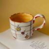 big ceramic mug with pumpkins in diffrent colors. perfect for coffee and tea. Μεγάλη κούπα με κολοκύθες σε διάφορα χρώματα. κατάλληλη για τσάι και καφέ.