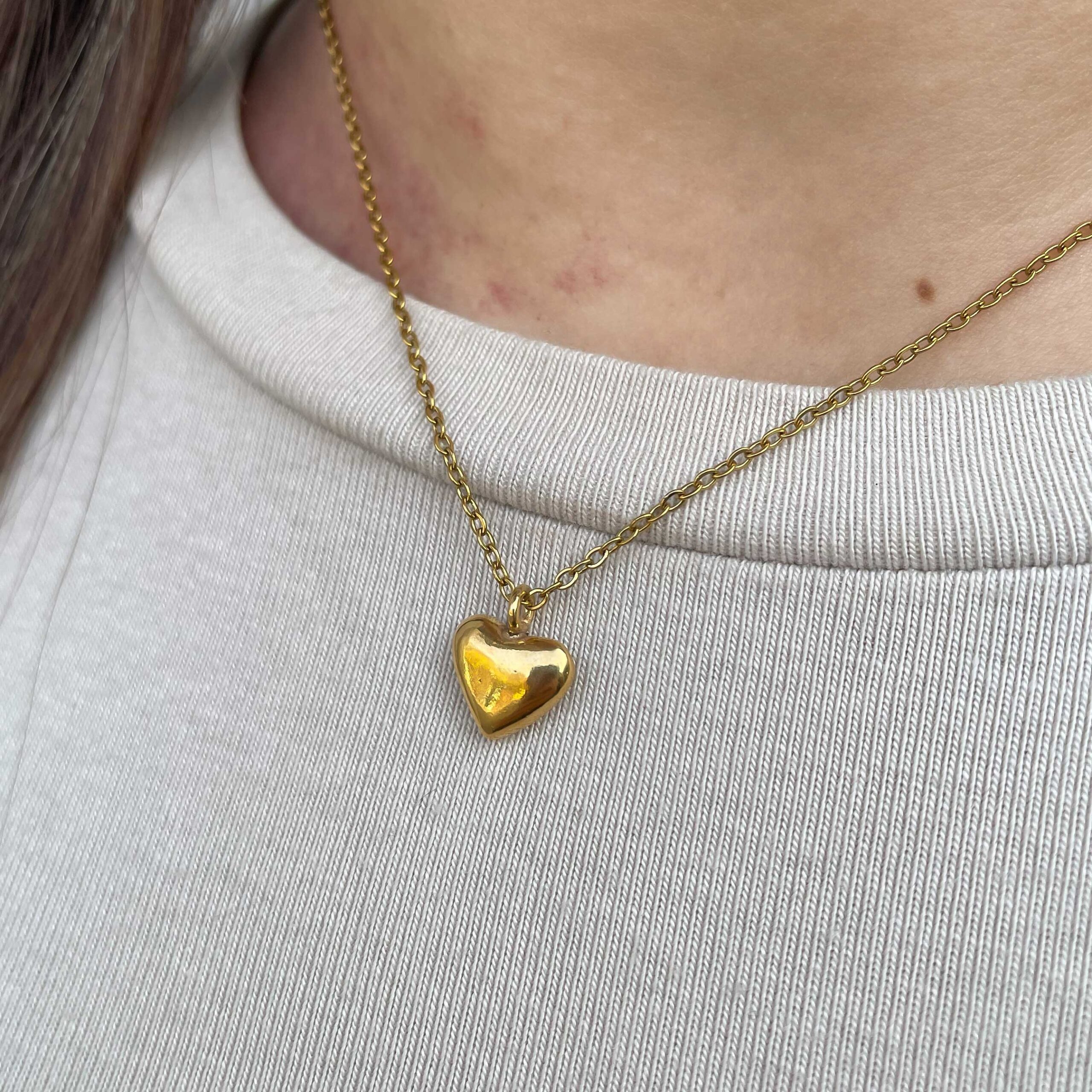 Handmade brass necklace with small bold heart pendant – Sunny Designs jewelry.