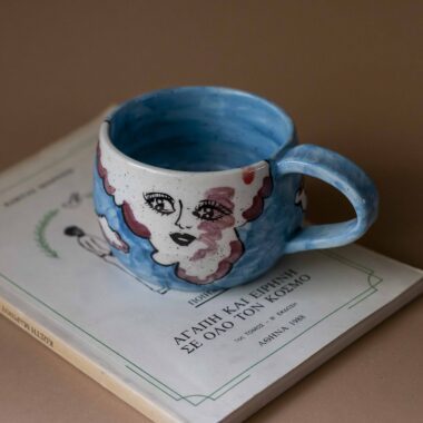 handmade ceramic mug with clouds and faces. an amazing perfect mug with celestial creatures perfect for capuccino and tea. Μια πανέμορφη χειροποίητη κούπα με συννεφάκια με πρόσωπα. Κατάλληλη για καπουτσίνο και τσάι.