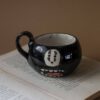 An amazing handmade ceramic mug with the faceless character. Good for espresso and turkish coffee. Χειροποίητη κεραμική κούπα με τον αγαπημένο απρόσωπο . Κατάλληλη για ελληνικό και εσπρέσο.