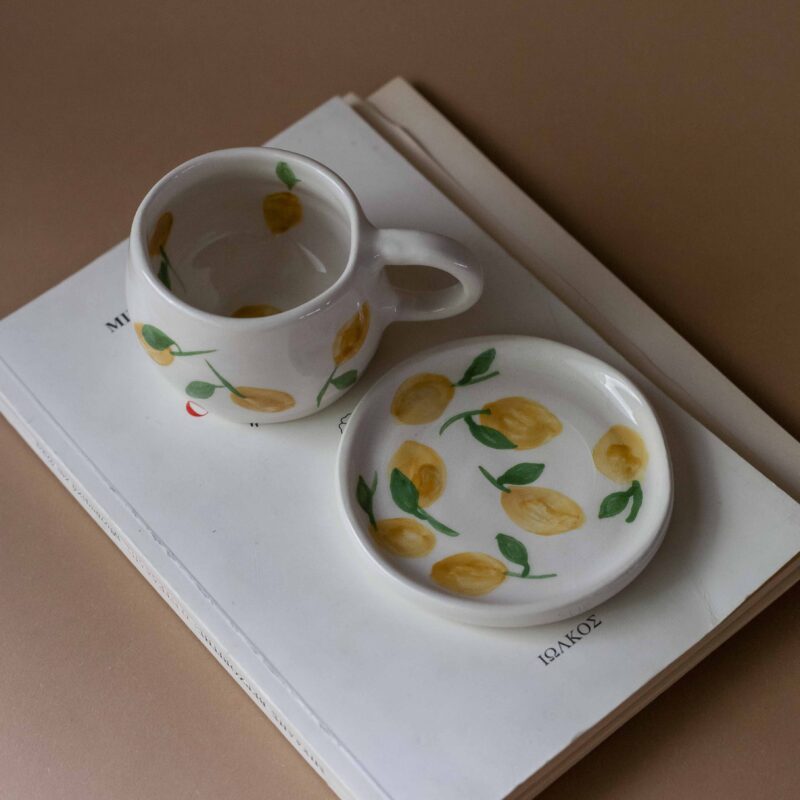 cute ceramic handmade cup with a saucer and fruits. Lemons, cherries and tangerines. perfect for espresso and single turkish coffee. Γλυκά χειροποίητα κεραμικά κουπάκια με πιατάκι και φρουτάκια. Κατάλληλη για εσπρέσο και μονό ελληνικό καφέ.